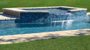 Imagine Pools FiberGlass Pool - The Pearl Tanning Ledge Pool By PoolForce - Fiberglass versus Concrete Pools: Pros, Cons, and Cost Comparisons