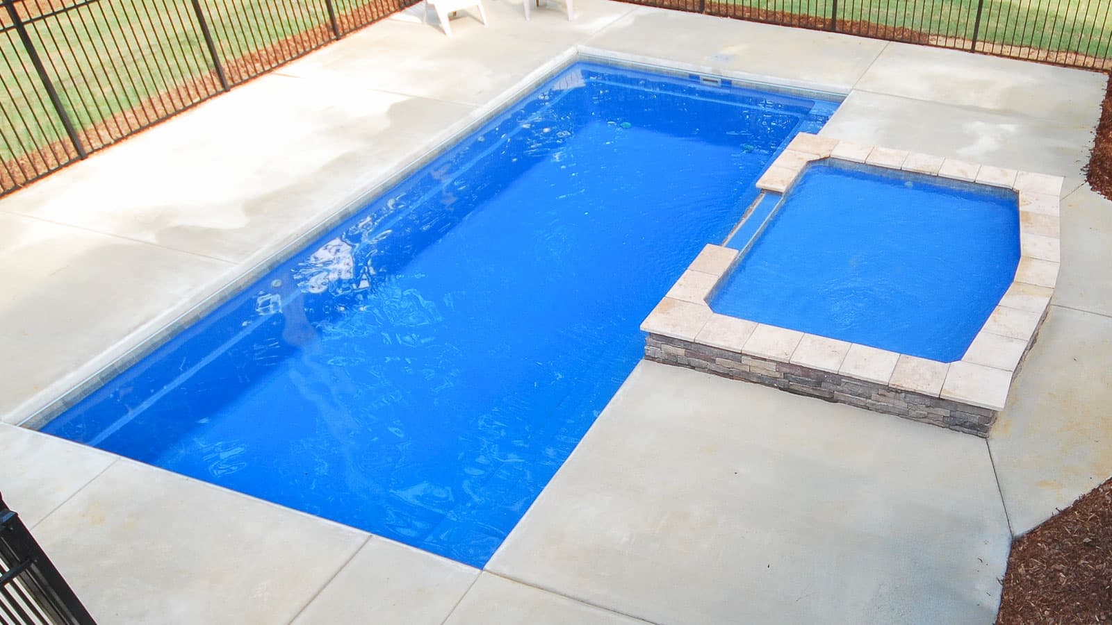 Imagine Pools FiberGlass Pool - The Pearl Tanning Ledge Pool By PoolForce - About Inground Pools