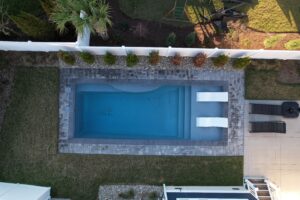 PoolForce Project San Juan Pools Wylela Beach in granite.