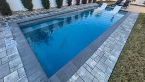 PoolForce Project San Juan Pools Wylela Beach in granite.