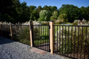 PoolForce - Aluminum Fencing Page - Oceanview - Black Oceanview Flush Bottom mounted onto Wood Posts